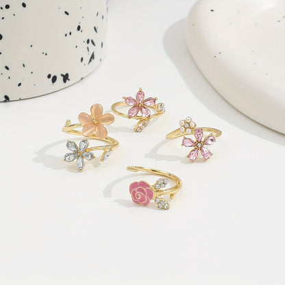 Set of alloy rings with rhinestones and pearls