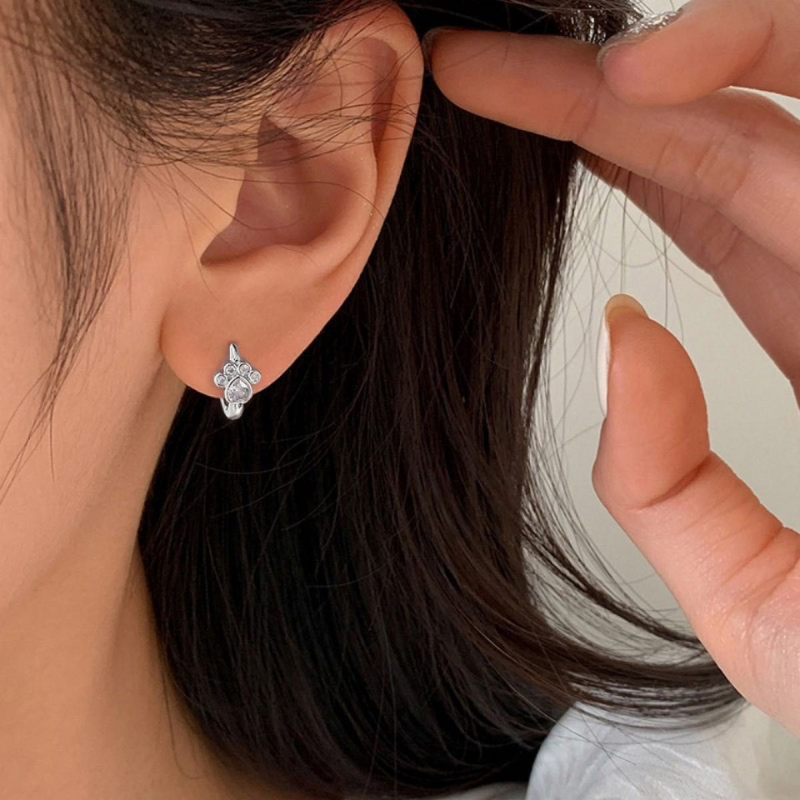 Small hoop earrings with paw print design