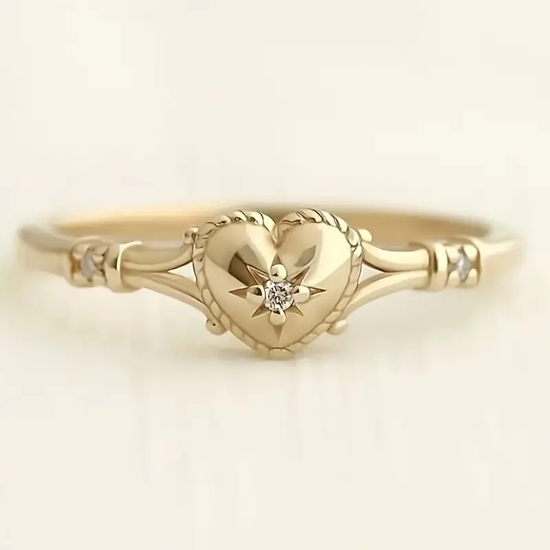 Elegant Gold Ring with Heart and Star