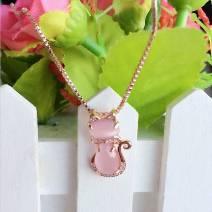 Necklace with an adorable pink stone cat featuring zircon